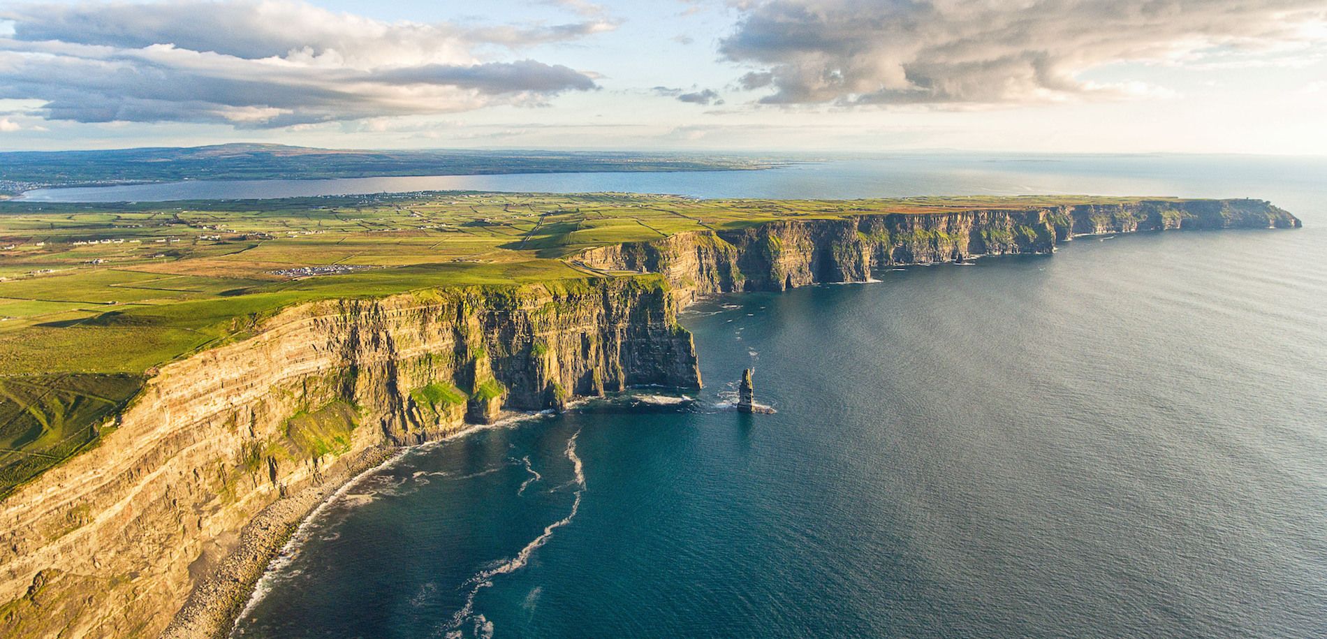 A beautiful coastal cliff landscape. Planet Friendly Apparel aims to help people look good and do good, by promoting a Sustainable Clothing ecosystem for Ireland